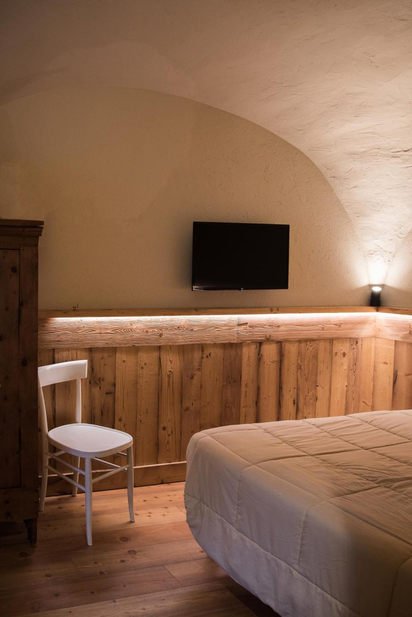 Le Bibelot Apartments Nus Quarto foto